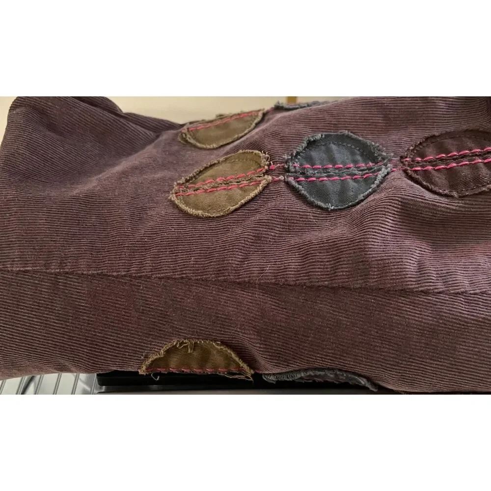 Boden dark brown corduroy a-line skirt with applique circles. Size 8.